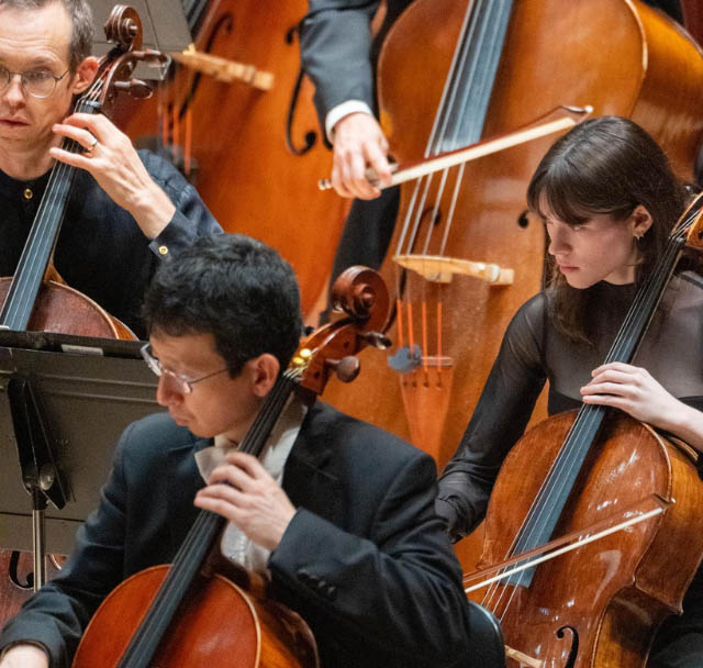 NCS musicians performing in concert on cellos