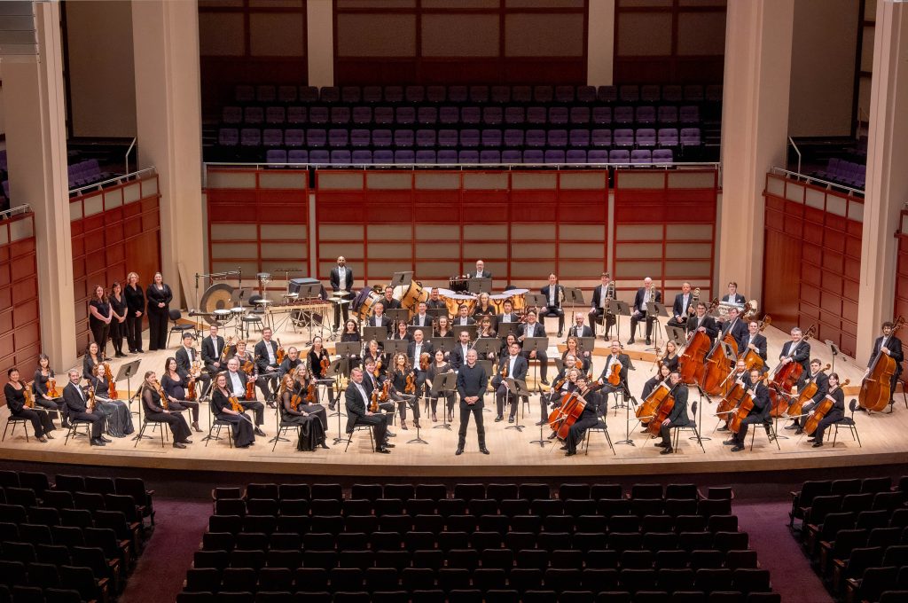 Musicians of the 2026/27 North Carolina Symphony on stage in Meymandi Concert Hall